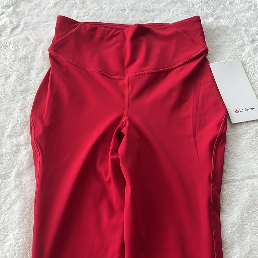 Lululemon Base Pace HR Tight 25”, Size 6. Color Dark Red NWT